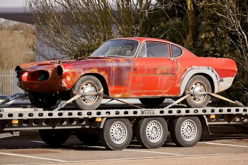 a car on a trailer doing towing services in mckinney